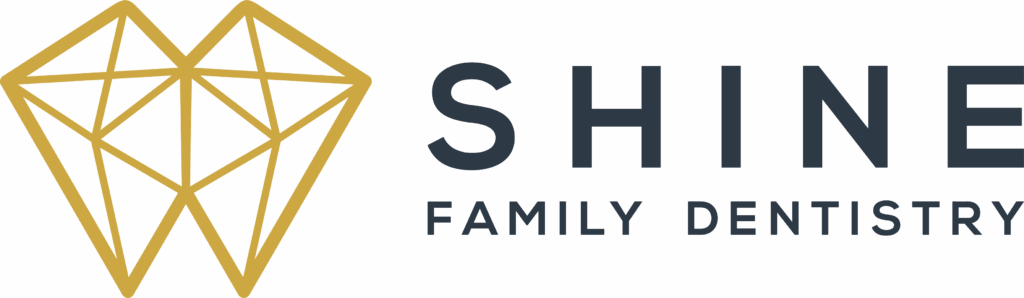 Logo for Shine Family Dentistry featuring a gold geometric diamond emblem on the left and bold black text on the right; “SHINE” in large uppercase letters above smaller “FAMILY DENTISTRY.”